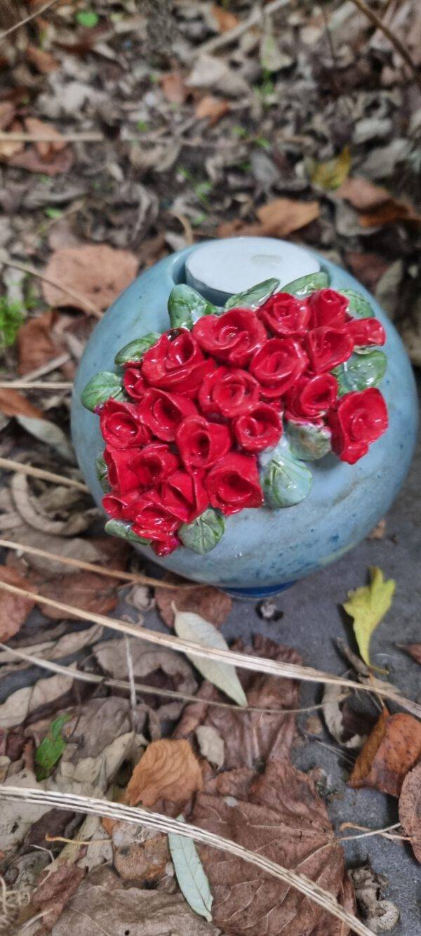 Urn waxinelicht met rode roosjes